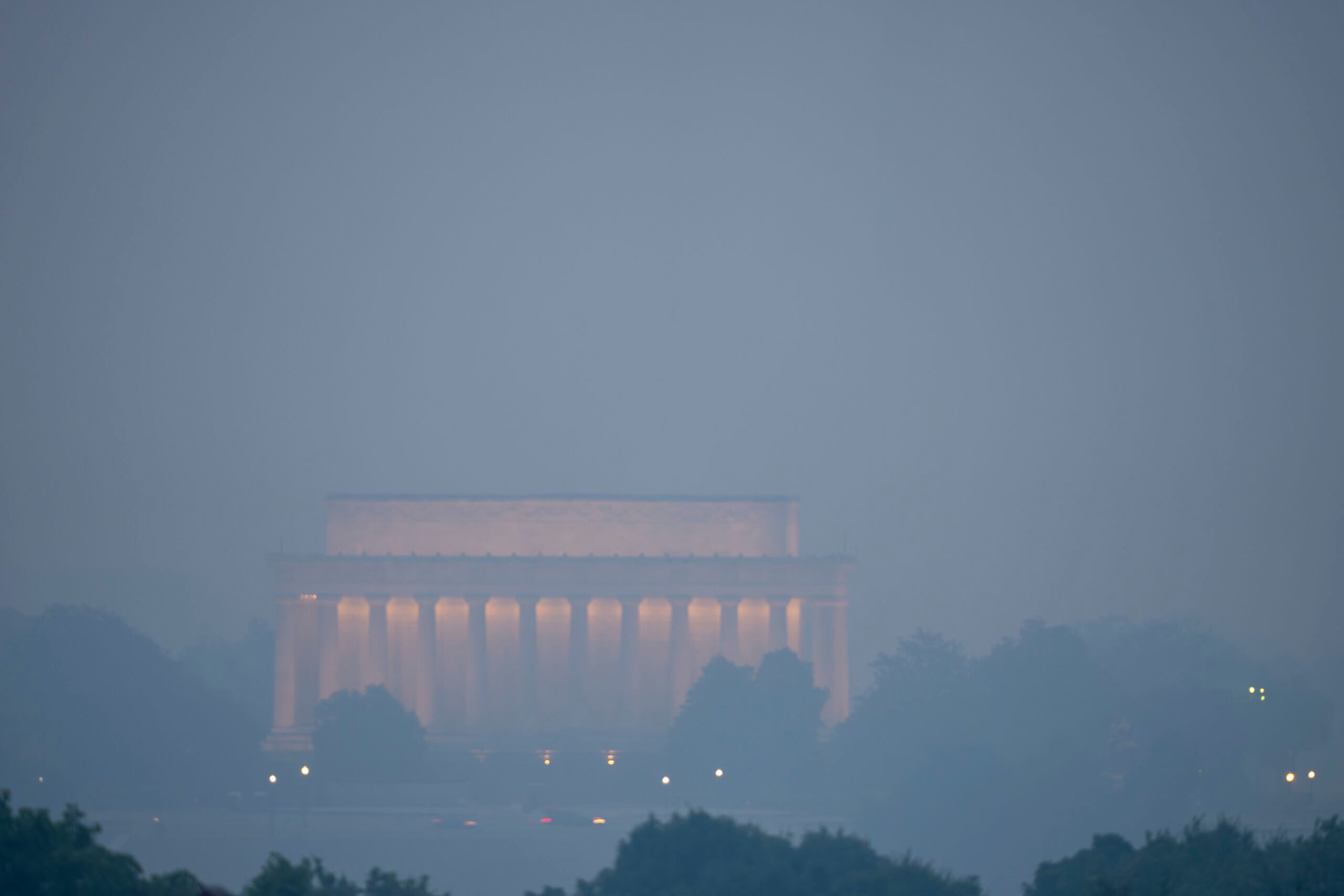 Haze blankets the Lincoln Memorial on the National Mall in Washington.