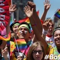 Members of Hopedale Gender Sexuality Alliance (GSA) cheer at the start of the Boston Pride Parade in Boston, MA on June 08, 2019.