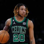 Boston Celtics guard JD Davison in the first half of an NBA basketball game against the Atlanta Hawks, Sunday, April, 9, 2023, in Boston.