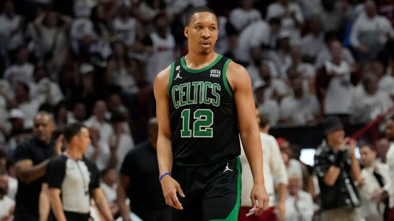 Boston Celtics forward Grant Williams (12) walks on the court during Game 3 of the NBA basketball playoffs Eastern Conference finals against the Miami Heat, Sunday, May 21, 2023, in Miami.