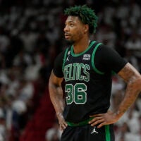 Boston Celtics guard Marcus Smart (36) stands on the court during the first half of Game 3 of the NBA basketball playoffs Eastern Conference finals against the Miami Heat, Sunday, May 21, 2023, in Miami.