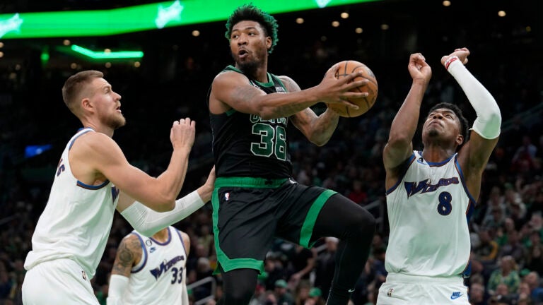 Report: Celtics trade Marcus Smart, add Porzingis in blockbuster