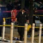 Denver Police Department investigators work the scene of a mass shooting early Tuesday, June 13.