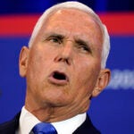 Republican presidential candidate former Vice President Mike Pence speaks at a campaign event.