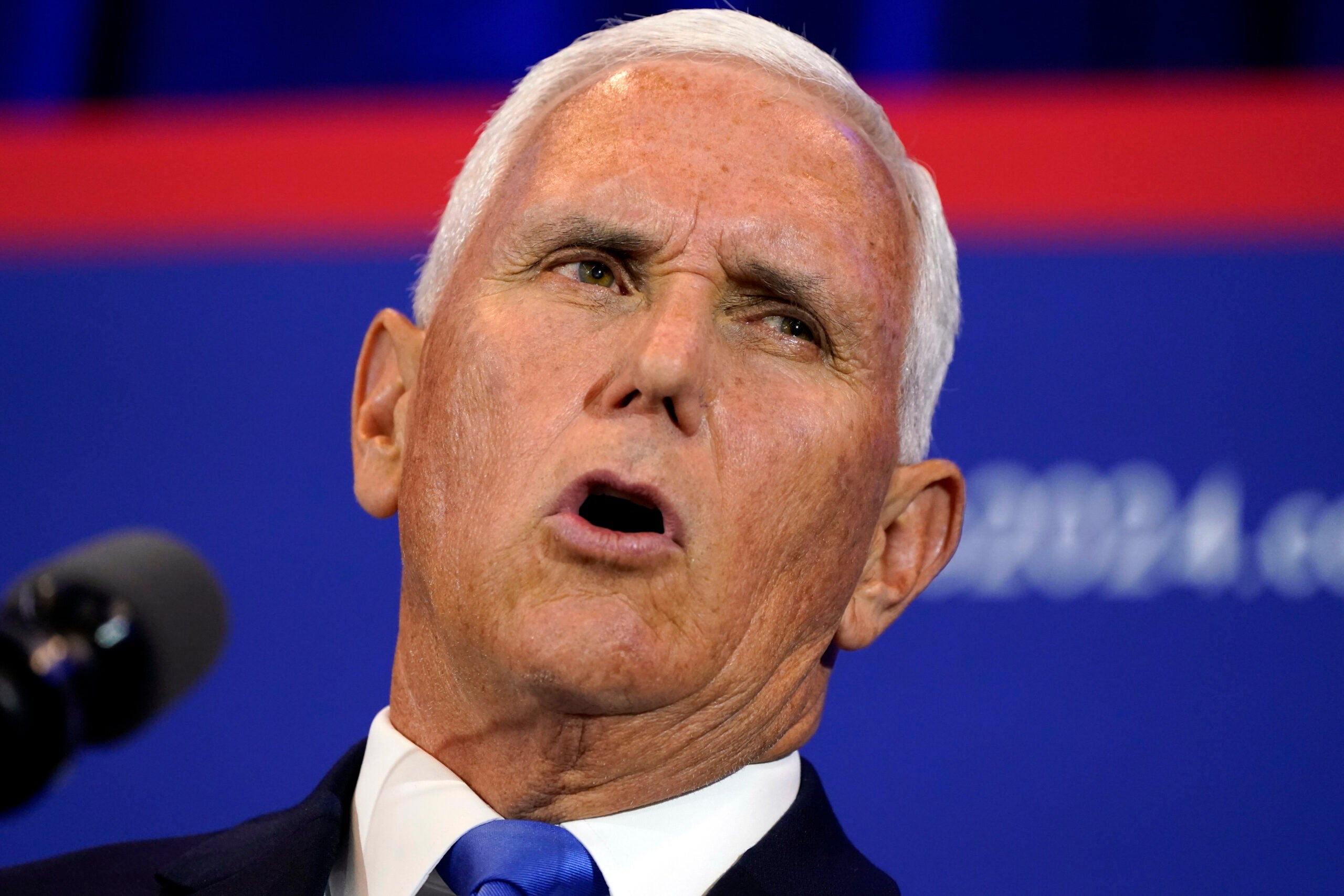 Republican presidential candidate former Vice President Mike Pence speaks at a campaign event.