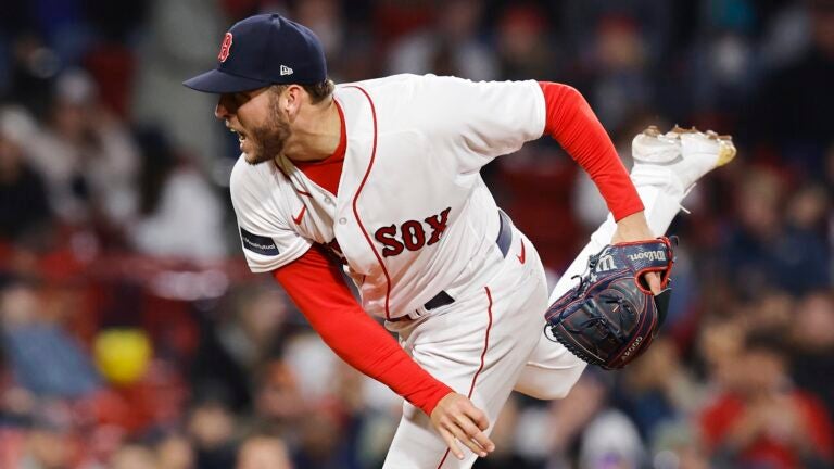 Boston Red Sox pitcher Kutter Crawford pitches during the eighth inning of a baseball game against the Cleveland Guardians