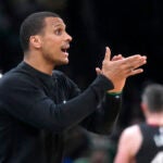 Boston Celtics head coach Joe Mazzulla yells to his team during the first half in Game 5 of an NBA basketball Eastern Conference Final series against the Miami Heat Thursday, May 25, 2023, in Boston.