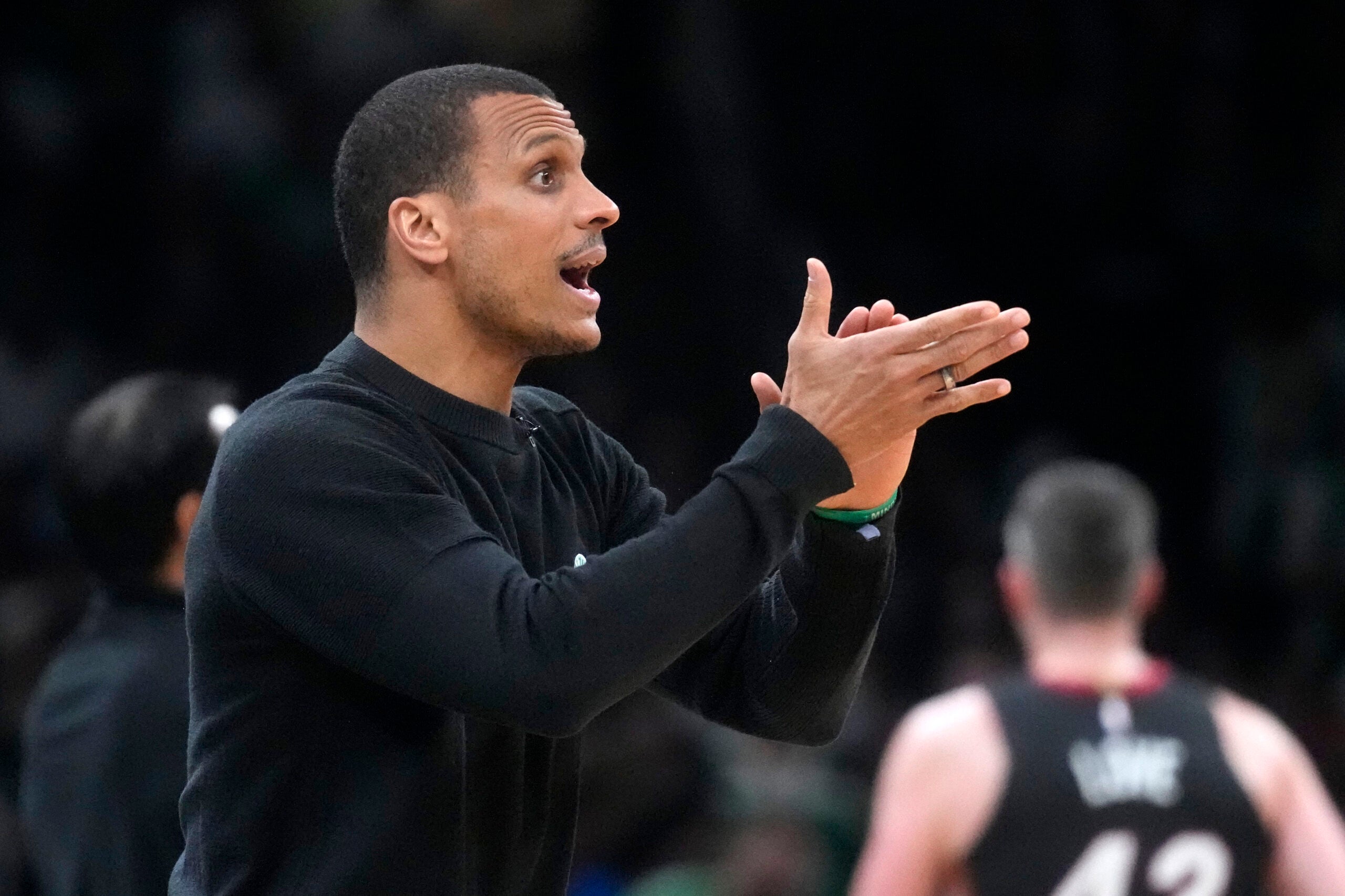 Boston Celtics head coach Joe Mazzulla yells to his team during the first half in Game 5 of an NBA basketball Eastern Conference Final series against the Miami Heat Thursday, May 25, 2023, in Boston.