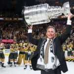 Head coach Bruce Cassidy of the Vegas Golden Knights hoists the Stanley Cup after defeating the Florida Panthers to win the championship in Game Five of the 2023 NHL Stanley Cup Final at T-Mobile Arena on June 13, 2023 in Las Vegas, Nevada.