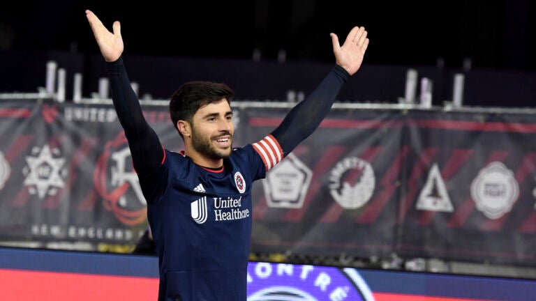 New England Revolution midfielder Carles Gil celebrates after a successful penalty kick in the first half of an MLS soccer match against CF Montreal.