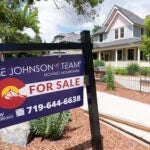 A for sale sign is used to illustrate a story on mortgage rates.