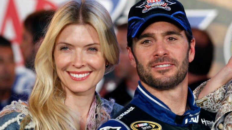 Jimmie Johnson poses with his wife, Chandra Janway, in victory lane after his win in a NASCAR Sprint Cup Series auto race at Texas Motor Speedway in Fort Worth, Texas, Nov. 4, 2012.