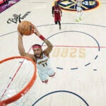 Denver Nuggets forward Bruce Brown dunks against the Miami Heat during the first half of Game 5.