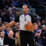 Referee Eric Lewis gestures during the first half of Game 5 of the NBA basketball Eastern Conference semifinal between the New York Knicks and the Miami Heat.