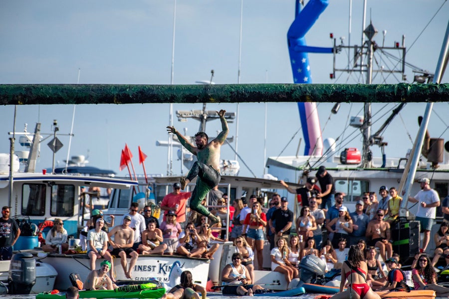 Greasy pole competition returns to St. Peter's Fiesta in Gloucester