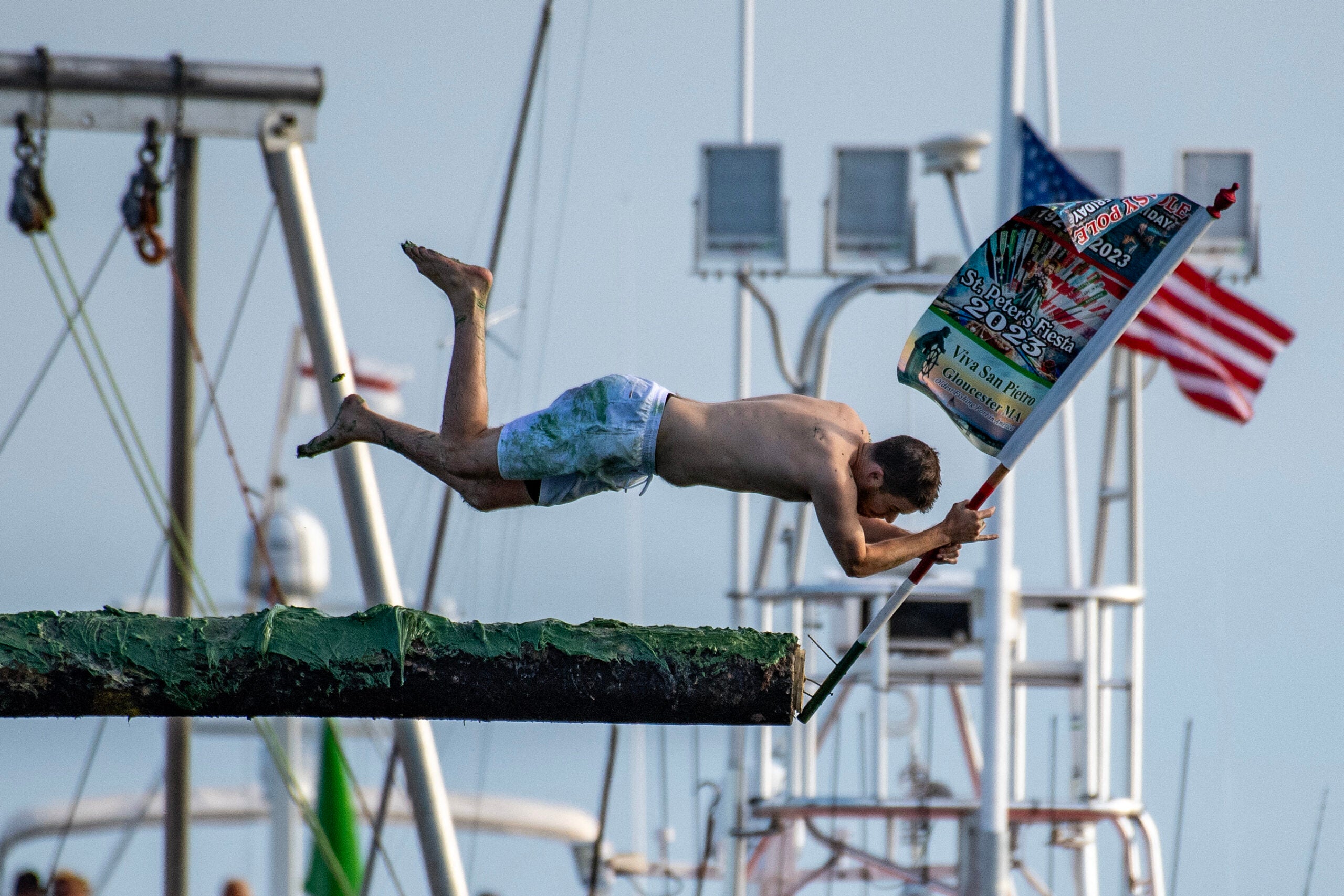 Greasy pole competition returns to St. Peter's Fiesta in Gloucester