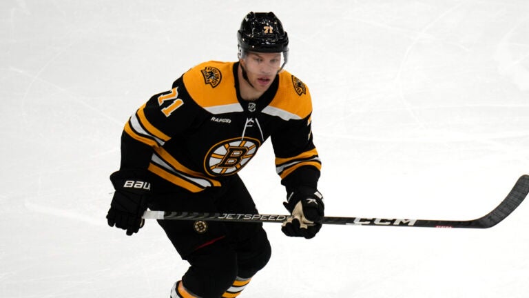 Boston Bruins left wing Taylor Hall (71) skates against New Jersey