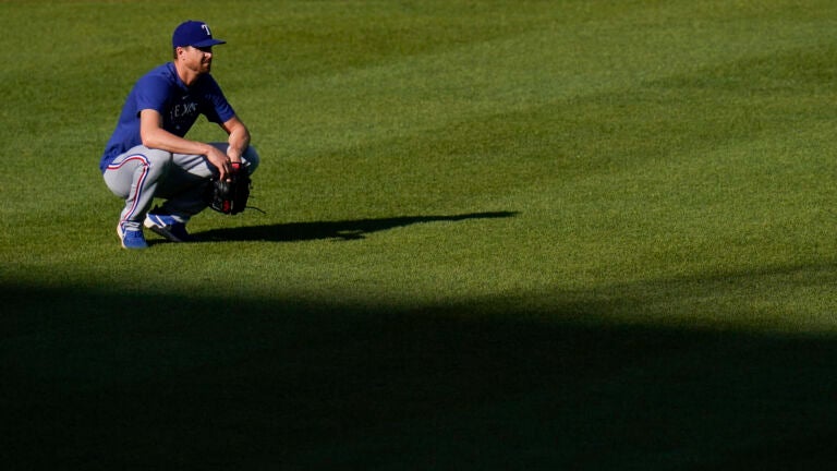 Texas Rangers pitcher Jacob deGrom works out prior to a baseball game against the Baltimore Orioles.