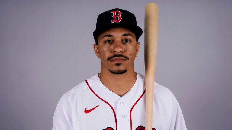 David Hamilton posing for a photo in a Red Sox uniform.
