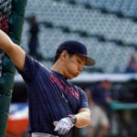 Boston Red Sox outfielder Masataka Yoshida warms up before a baseball game against the Cleveland Guardians.