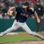 Boston Red Sox relief pitcher Chris Murphy pitches in the eighth inning.