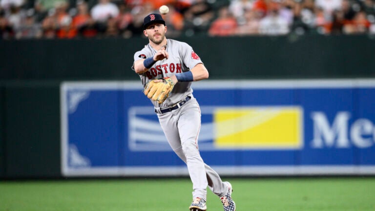 Boston Red Sox second baseman Trevor Story (10) in action during a baseball game against the Baltimore Orioles, Friday, Sept. 9, 2022, in Baltimore.