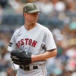 Boston Red Sox starting pitcher Corey Kluber gets set to throw a pitch during a baseball game against the San Diego Padres on Sunday, May 21, 2023, in San Diego.
