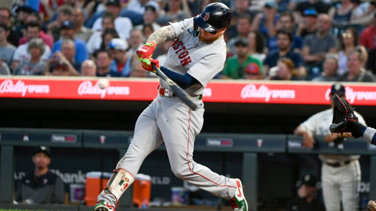 Red Sox outfielder Alex Verdugo hits an RBI single.