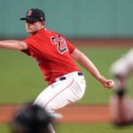 Boston Red Sox starting pitcher Garrett Whitlock winds up.