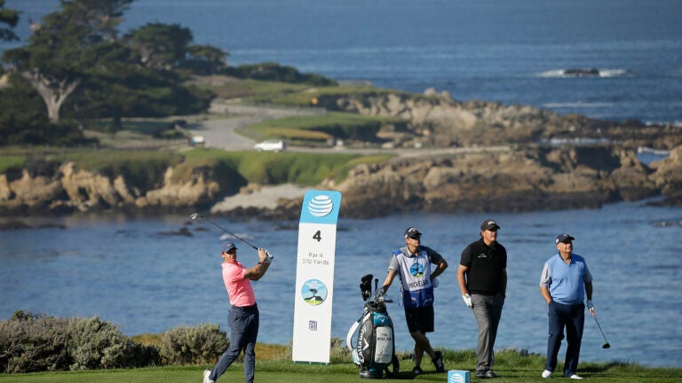 PGA Tour member Rory McIlroy, of Northern Ireland, hits from the fourth tee of the Spyglass Hill Golf Course during the first round of the AT&T Pebble Beach National Pro-Am golf tournament in 2018.