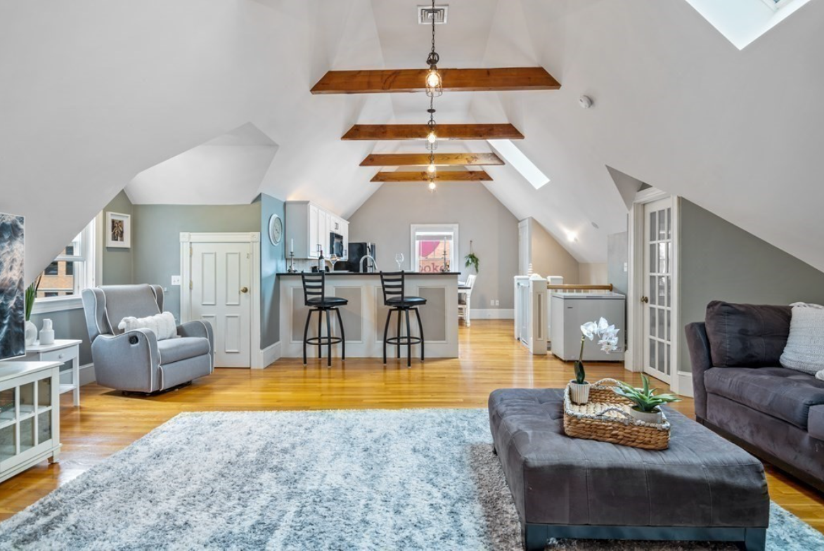 For under $600k, a Roslindale condo with exposed brick and beams