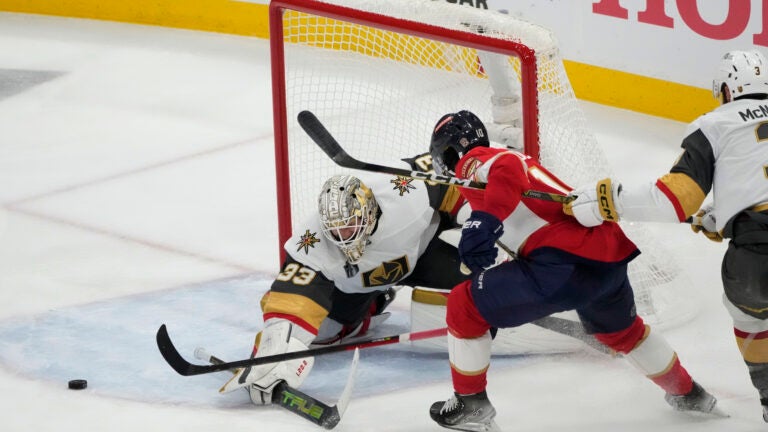 Vegas Golden Knights goaltender Adin Hill (33) defends the net from a shot by Florida Panthers left wing Anthony Duclair (10) during the second period of Game 3 of the NHL hockey Stanley Cup Final.