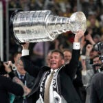 Vegas Golden Knights head coach Bruce Cassidy holds up the Stanley Cup after the Knights defeated the Florida Panthers 9-3 in Game 5 of the NHL hockey Stanley Cup Finals Tuesday, June 13, 2023, in Las Vegas. The Knights won the series 4-1.