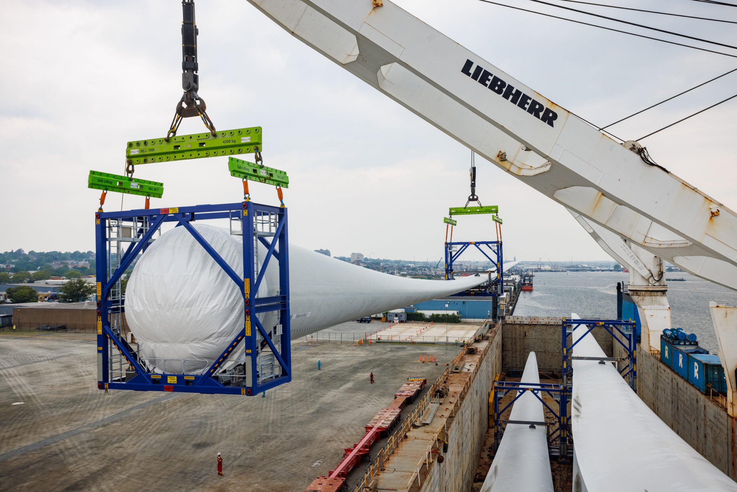 A turbine blade more than 300 feet long built for an offshore wind project at the New Bedford Marine Commerce Terminal.