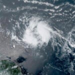 This GeoColor satellite image taken Tuesday, June 20, 2023, and provided by NOAA shows Tropical Storm Bret as it chugged toward the eastern Caribbean.