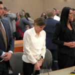 Kouri Richins, center, lowers her head following a bail hearing Monday, June 12, 2023, in Park City, Utah.