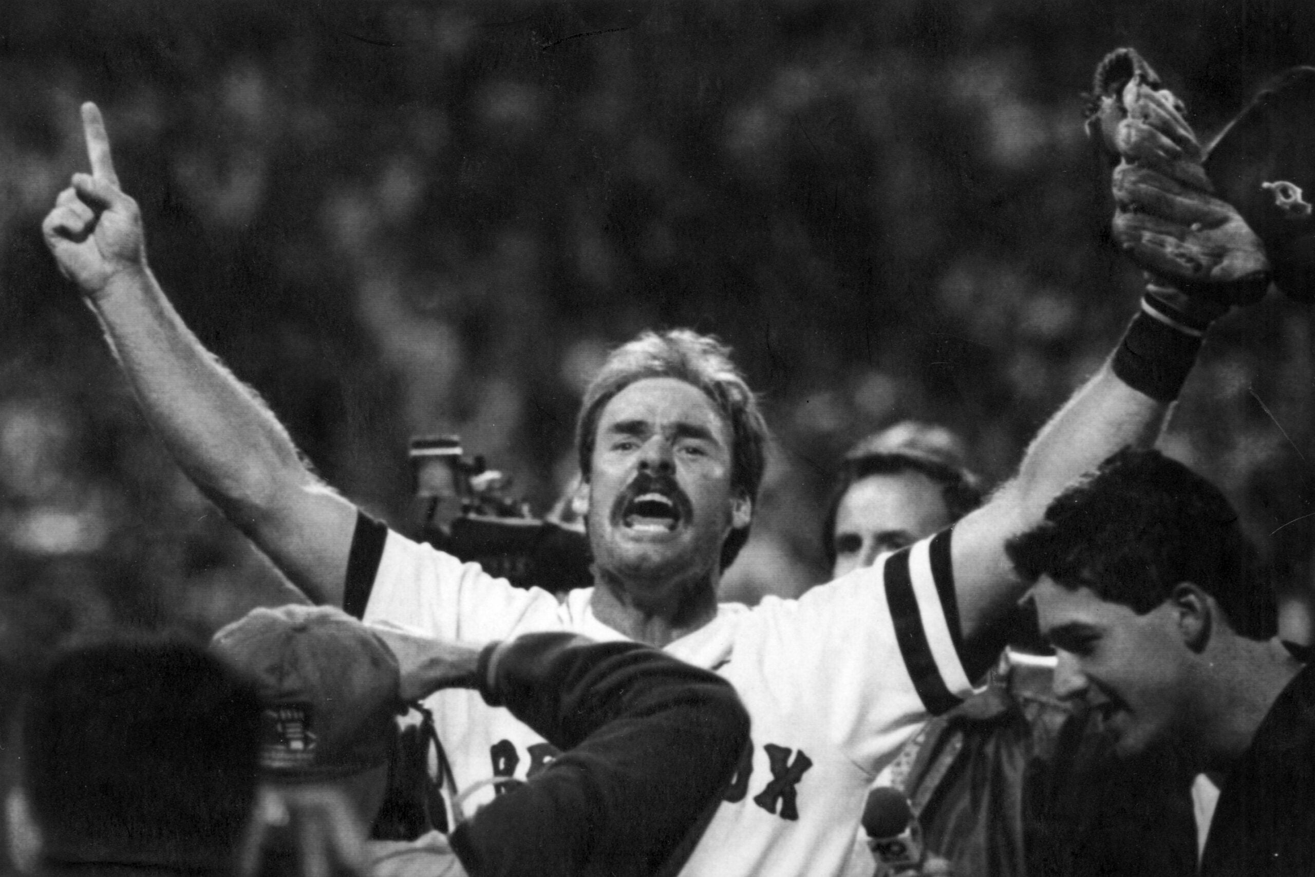 Red Sox third baseman Wade Boggs celebrates clinching the AL East.