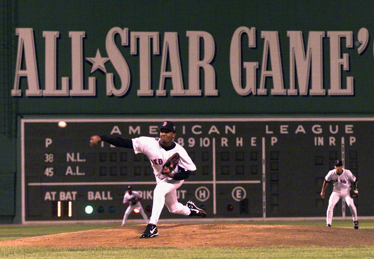 Pedro Martinez pitches while Nomar Garciaparra plays shortstop at the 1999 MLB All-Star Game. 