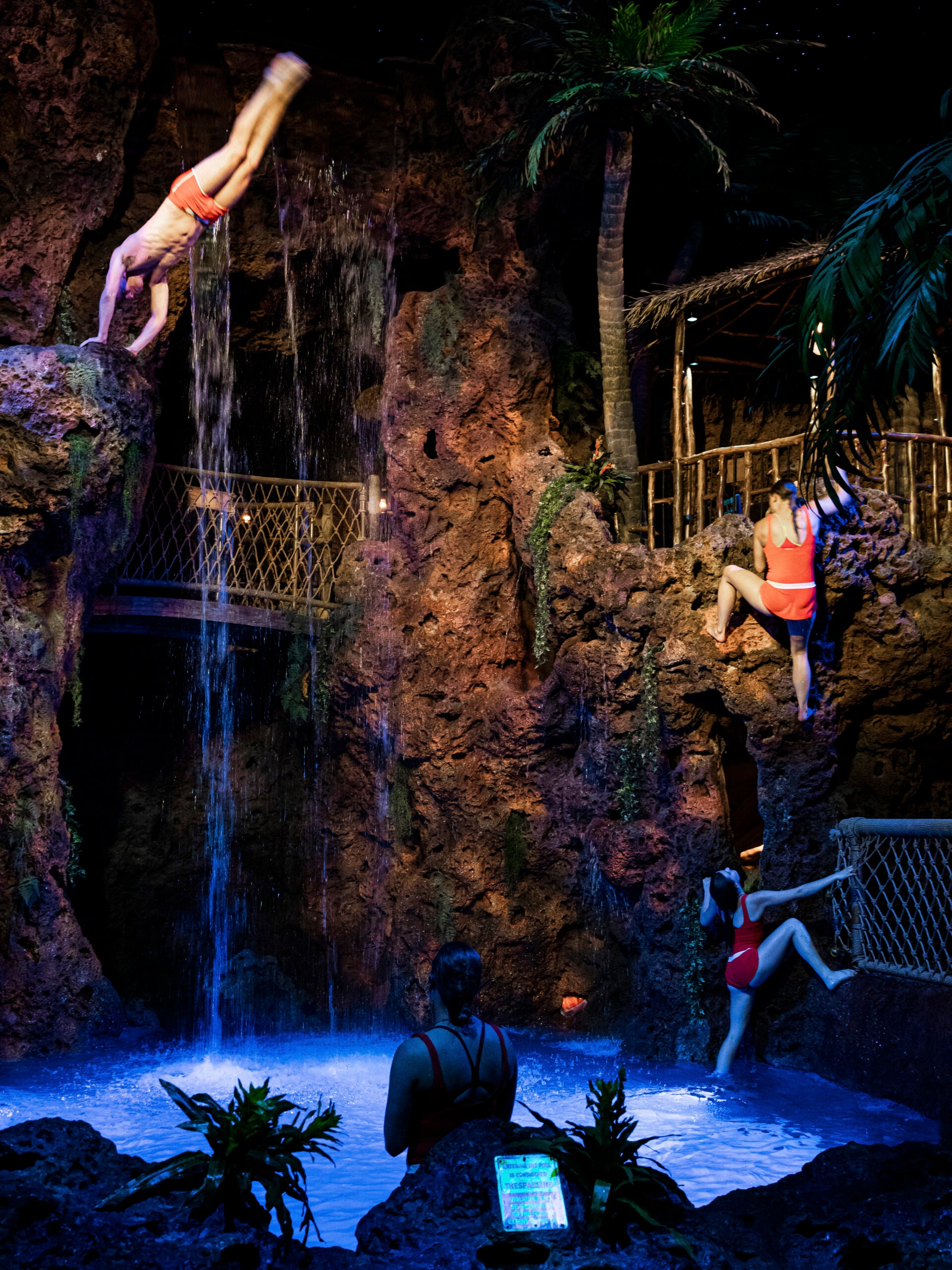 Cliff divers practice their routines in a renovated pool area at the refurbished Casa Bonita in Lakewood, Colo.