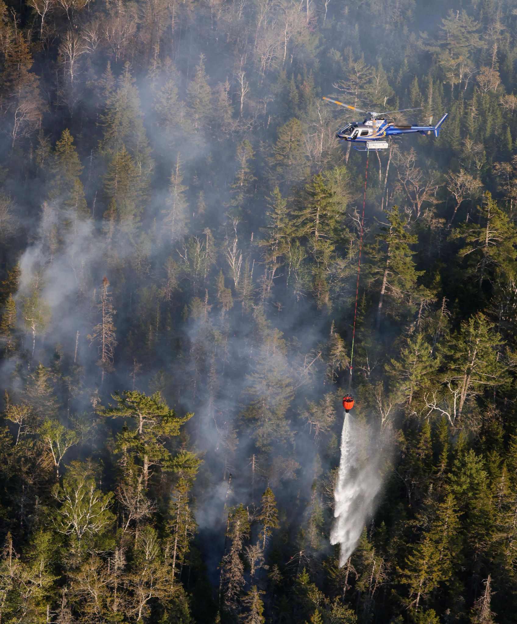 Photos: Hundreds of wildfires blaze throughout Canada