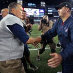 Patriots head coach Bill Belichick (left) and Texans head coach Bill O'Brien (right) shake hands after New England's victory. The New England Patriots hosted the Houston Texans in a Thursday night NFL regular season football game.