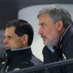 The Boston Bruins practiced at Warrior Ice Arena. Bruins GM Don Sweeney(left) and Cam Neely watch practice.