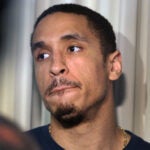 Celtics guard Malcolm Brogdon is pictured taking questions from media members.