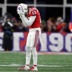 After he couldn't quite make the play on a second quarter possible interception, Patriots DB Jack Jones reacted. The New England Patriots hosted the Buffalo Bills for a Thursday Night NFL football game at Gillette Stadium.