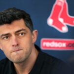 Red Sox Chief Baseball Officer Chaim Bloom is pictured as he listens to a question from a reporter.