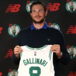 Boston Celtics introduced their new players Malcolm Brogdon (cq) left and Danilo Gallinari (cq) middle at a press conference at the Auerbach Center.