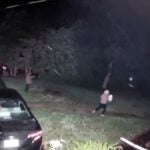 A man follows a woman from the South Acton MBTA Commuter Rail station to a nearby home in Acton, Massachusetts.