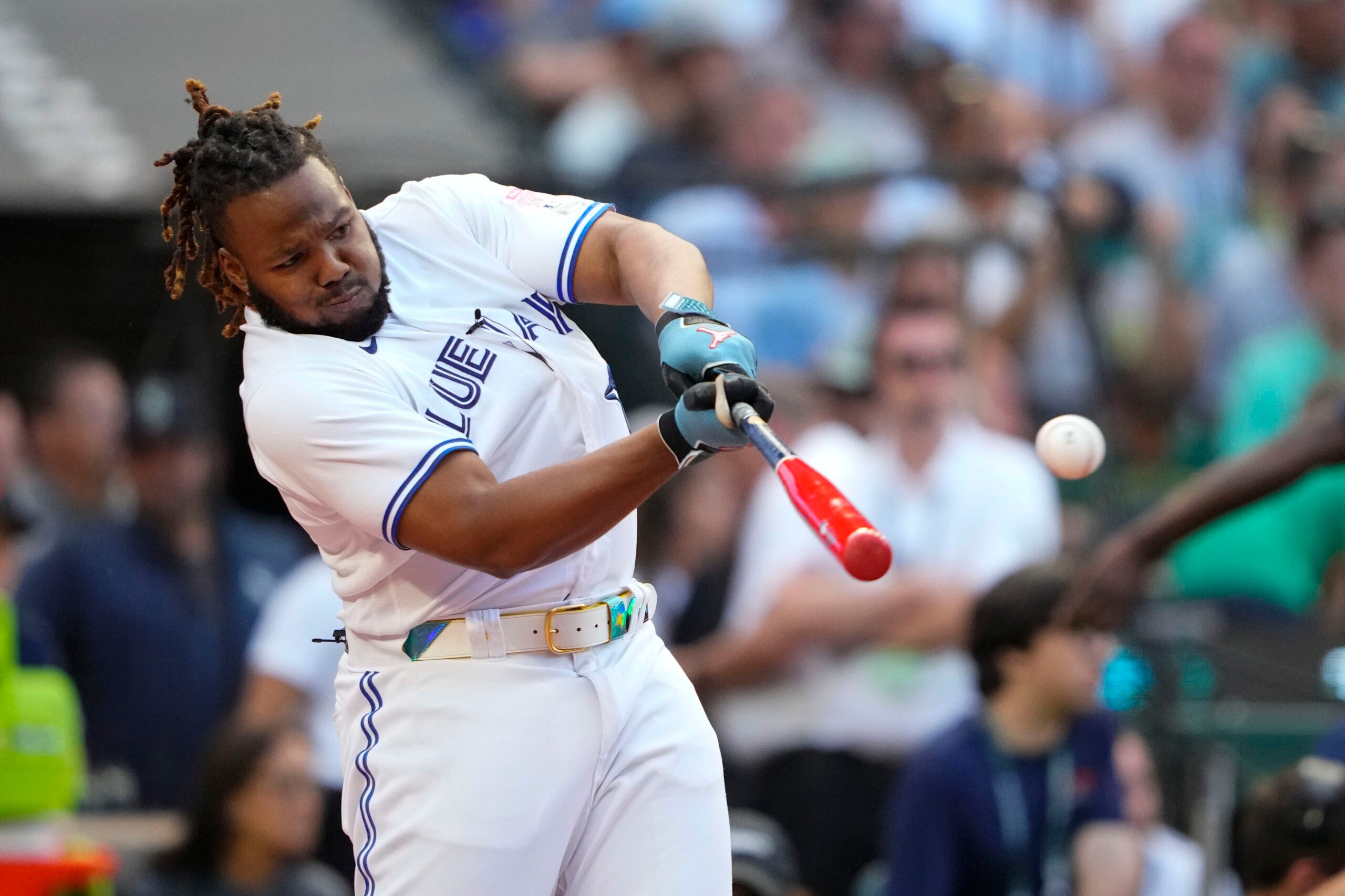 American League's Vladimir Guerrero Jr., of the Toronto Blue Jays, hits in the semifinal round during the MLB All-Star baseball Home Run Derby in Seattle.