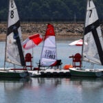 Boston weather -- , MA - 7/05/2023: SHADE from an umbrella in a park, beach or even from trees was needed today in the warm July sun around Boston.