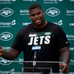 New York Jets defensive tackle Quinnen Williams delivers a press conference.